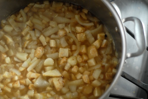 celery root and onion in the pot