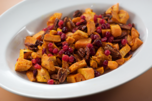 sweet potatoes with candied pecans and strawberries